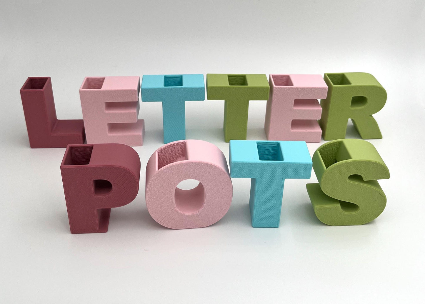 Mini LetterPots desktop storage pots. Use as a vase for a few flowers or a wordy decoration or display.