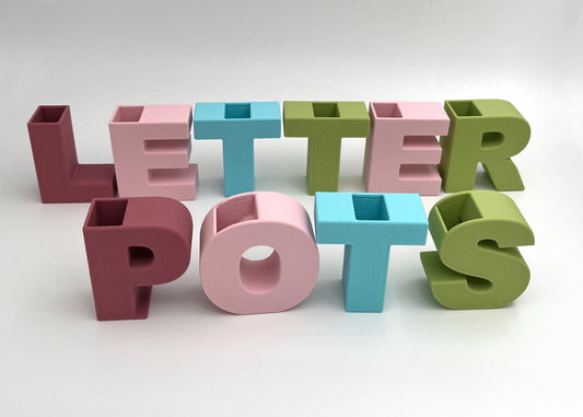 Mini LetterPots desktop storage pots. Use as a vase for a few flowers or a wordy decoration or display.